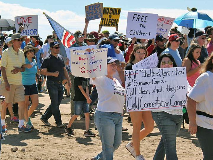 Protesters rally outside a detention camp for immigrant children in Tornillo, Texas