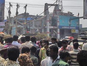 Waiting outside the collapsed garment factory building in Bangladesh