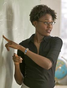 A teacher at the blackboard